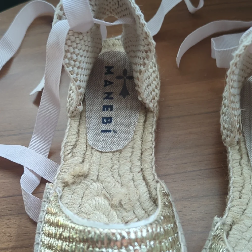 Manebi Elegant Gold Espadrille Flats with Ribbon Accents
